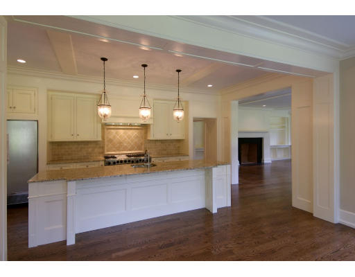 15 Walnut Road Weston, MA 02493 - Photo 4 of 10 a open kitchen with stainless steel appliances granite countertop a sink a refrigerator and a granite counter tops