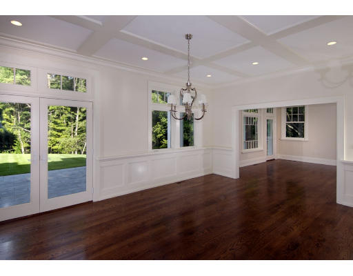15 Walnut Road Weston, MA 02493 - Photo 6 of 10 a view of an empty room with wooden floor and a window
