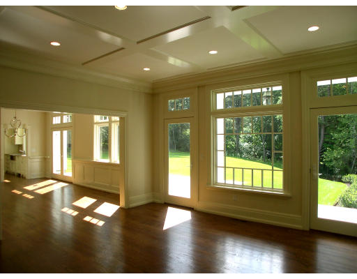 15 Walnut Road Weston, MA 02493 - Photo 9 of 10 a view of empty room with wooden floor and windows