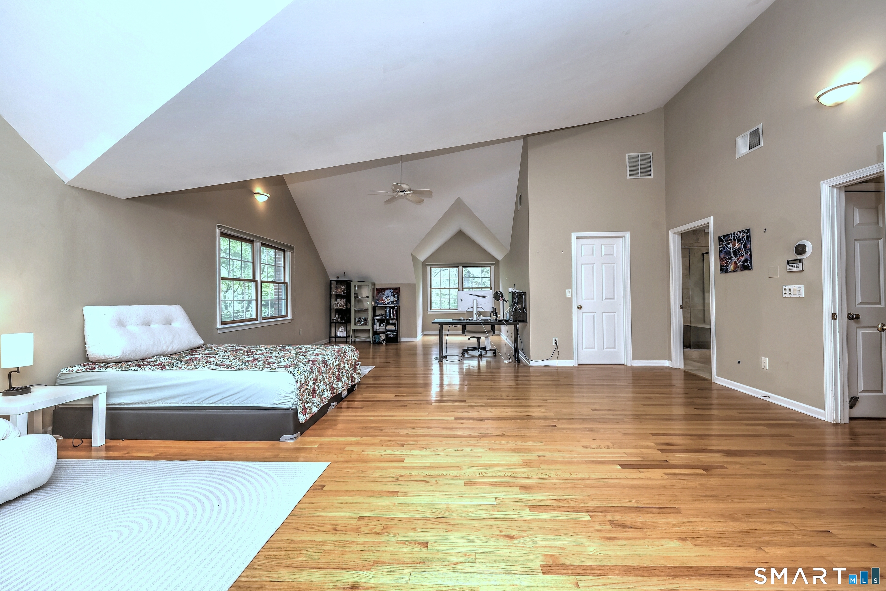 125 Peck Hill Road Woodbridge, CT 06525 - Photo 26 of 40 a living room with furniture and a wooden floor