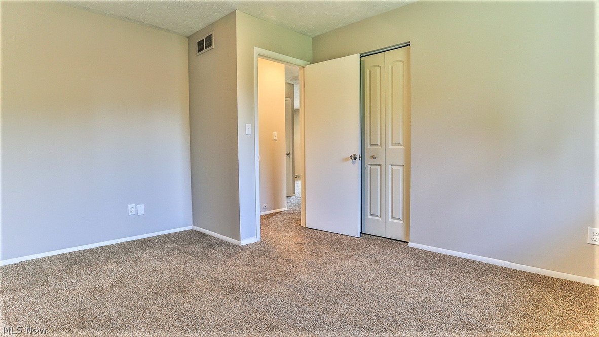 2116 Portage Line Road Mogadore, OH 44260 - Photo 25 of 35 *BDRM #1 ON THE FIRST FLOOR WITH CARPET, NEW PAINT AND TRIM ~