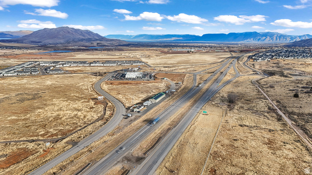 15371 Frontage Road Santaquin, UT 84655 - Photo 10 of 18 Overview of rural landscape with a mountainous background and a desert landscape