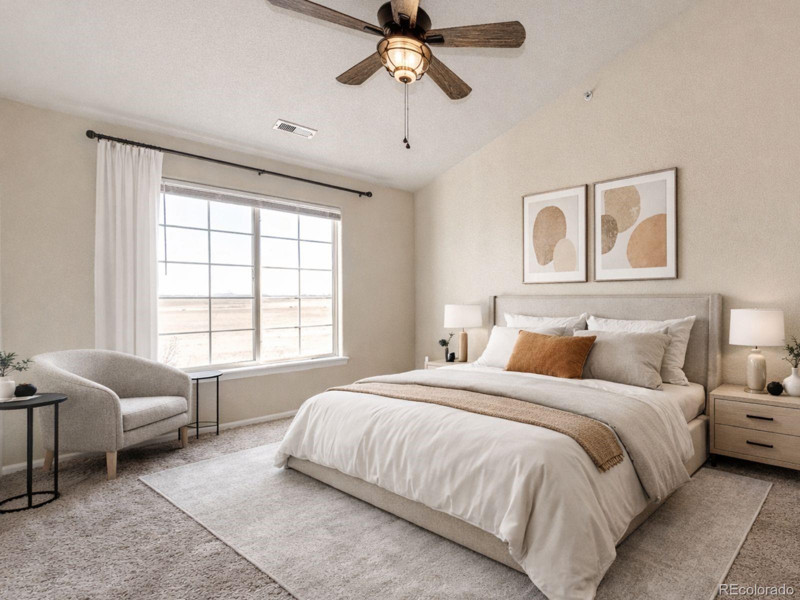 5255 Memphis Street, Unit 122 Denver, CO 80239 - Photo 15 of 26 a bedroom with a bed couches and window