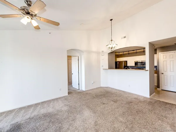 a view interior of a house and a chandelier fan