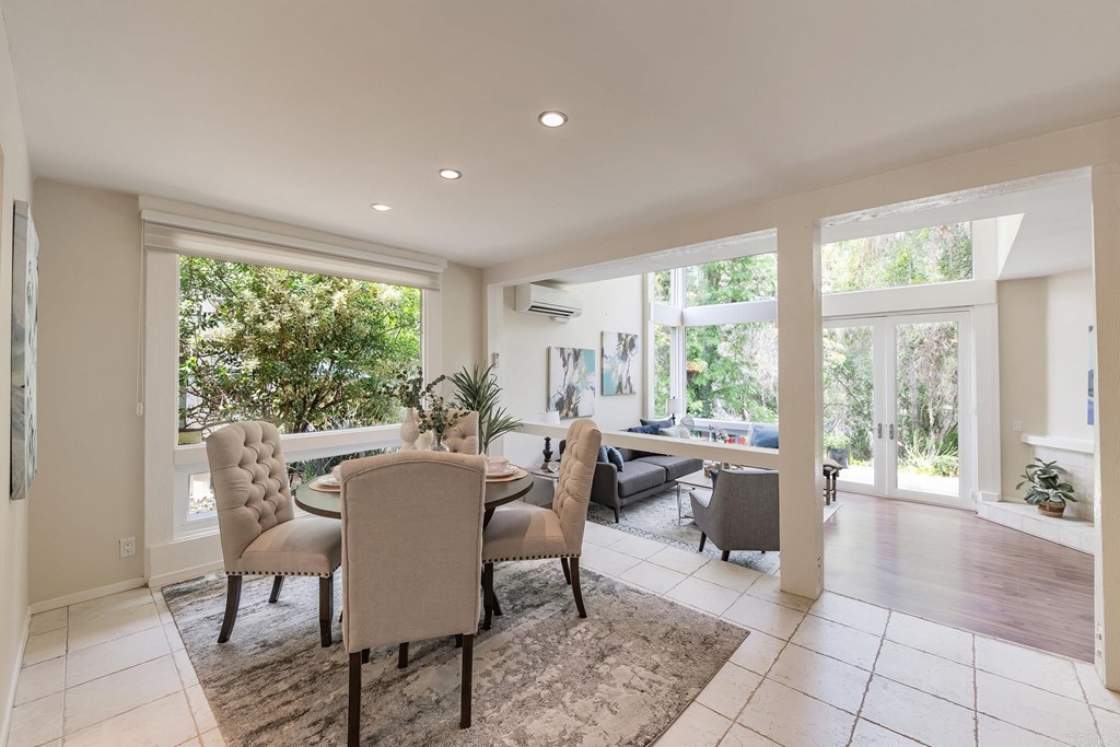 3112 Via De Caballo Encinitas, CA 92024 - Photo 5 of 31 a living room with furniture and large windows
