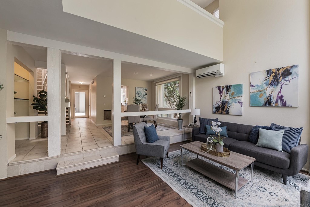3112 Via De Caballo Encinitas, CA 92024 - Photo 6 of 31 a living room with furniture and wooden floor