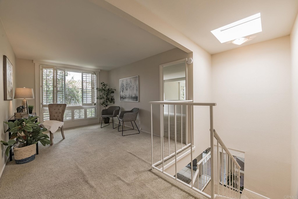 3112 Via De Caballo Encinitas, CA 92024 - Photo 8 of 31 a view of a livingroom with furniture and a floor to ceiling window
