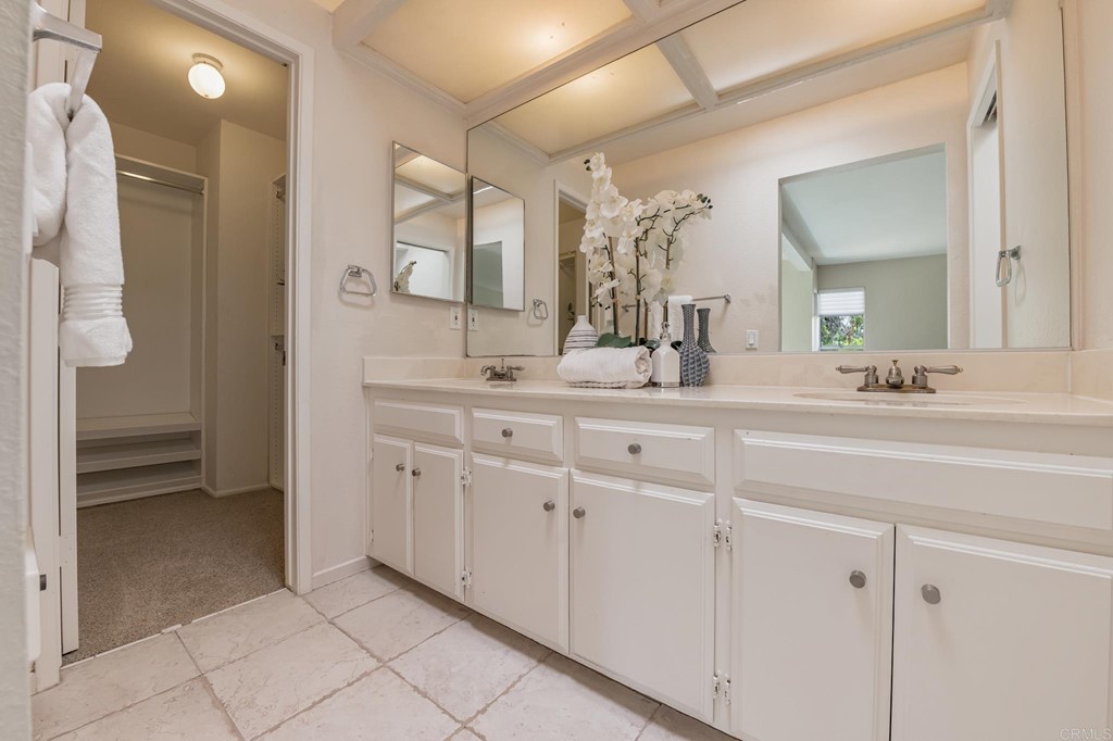 3112 Via De Caballo Encinitas, CA 92024 - Photo 10 of 31 a bathroom with a double vanity sink mirror and