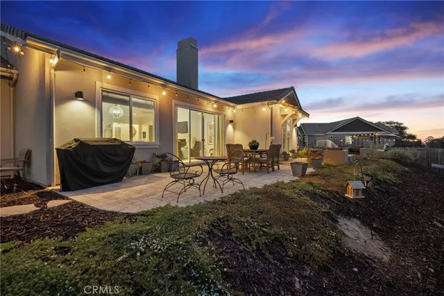 a view of swimming pool with outdoor seating