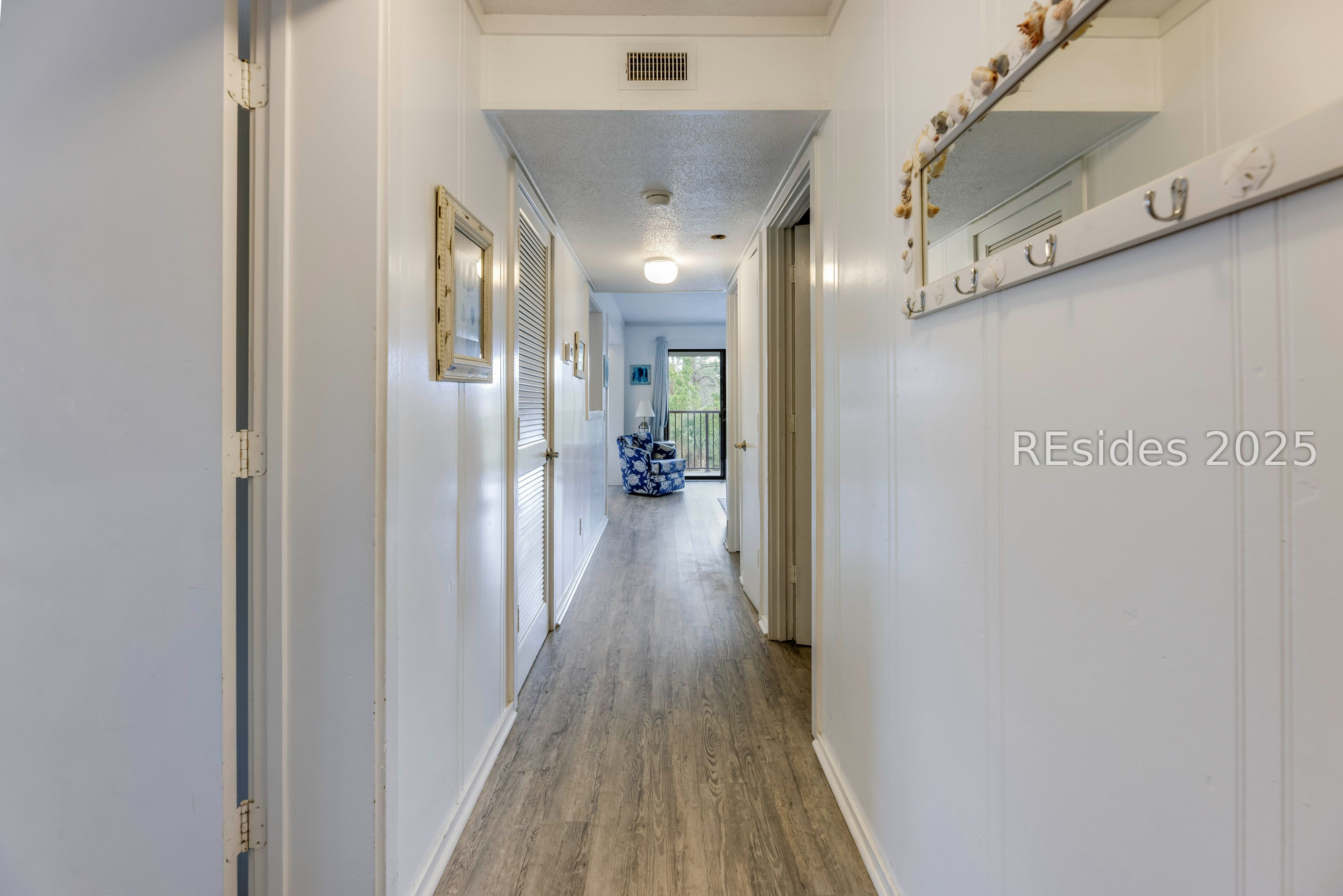 40 Folly Field Road, Unit 244 Hilton Head Island, SC 29928 - Photo 3 of 25 New flooring throughout enhances entry hall.