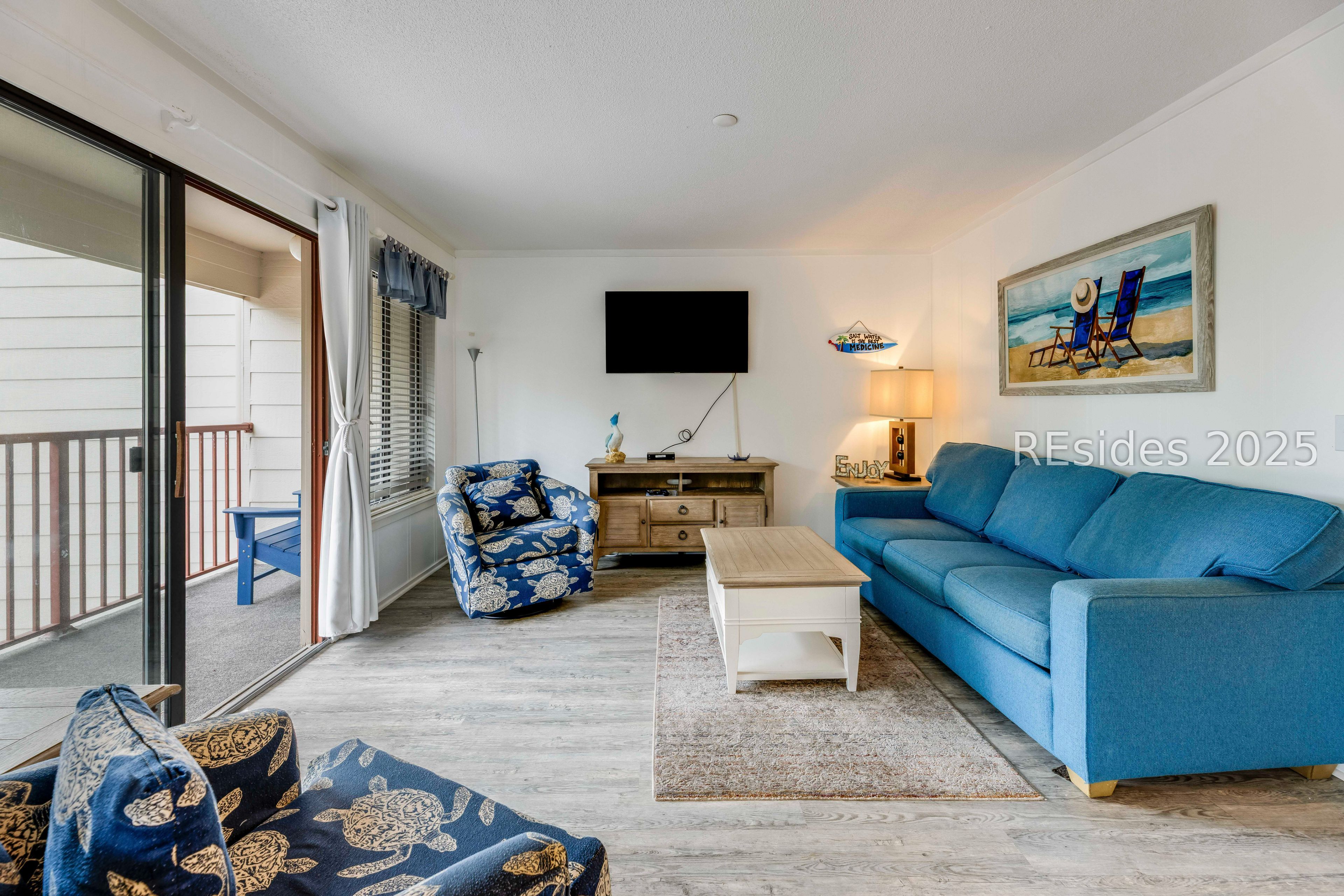 40 Folly Field Road, Unit 244 Hilton Head Island, SC 29928 - Photo 4 of 25 Comfortable living room flows easily to deck.