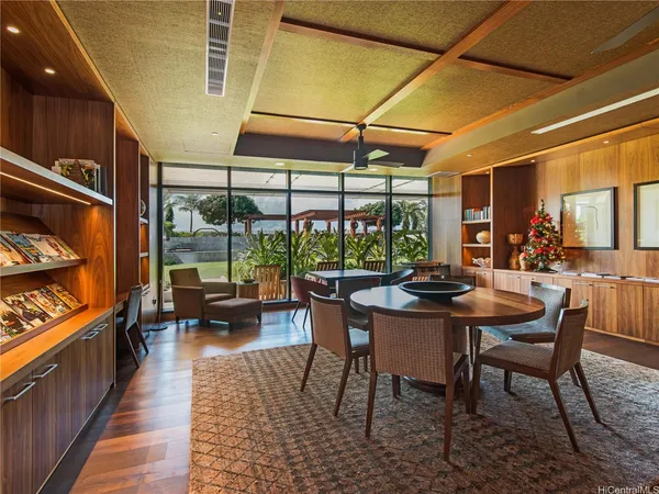 a view of a dining room with furniture window and outside view