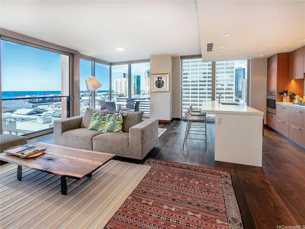 a living room with furniture and a rug