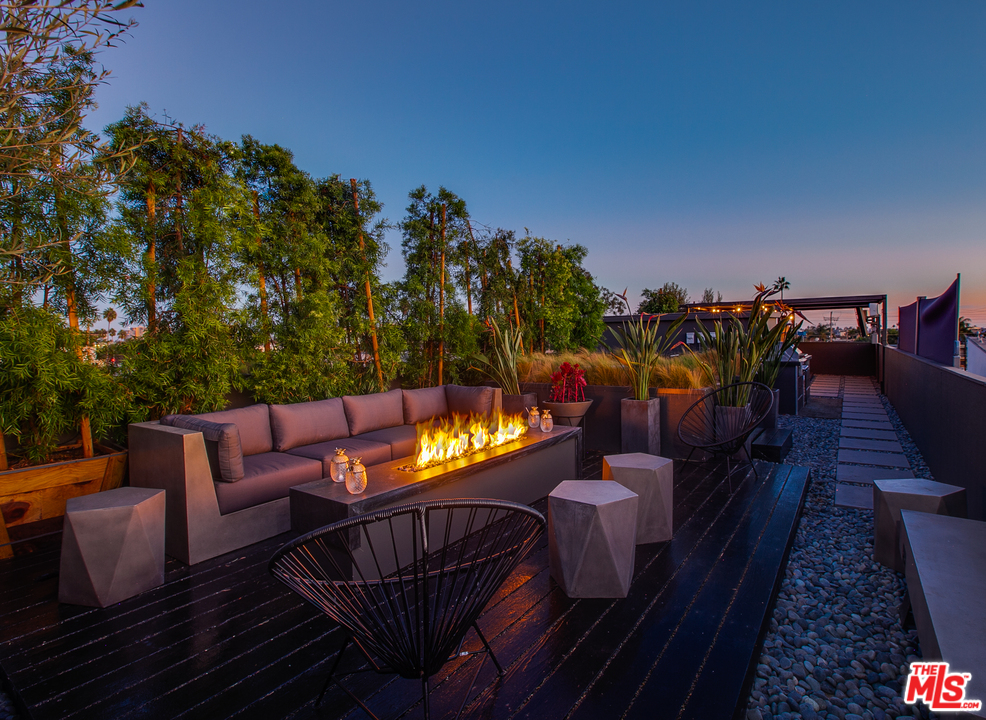a view of a couches in the roof deck