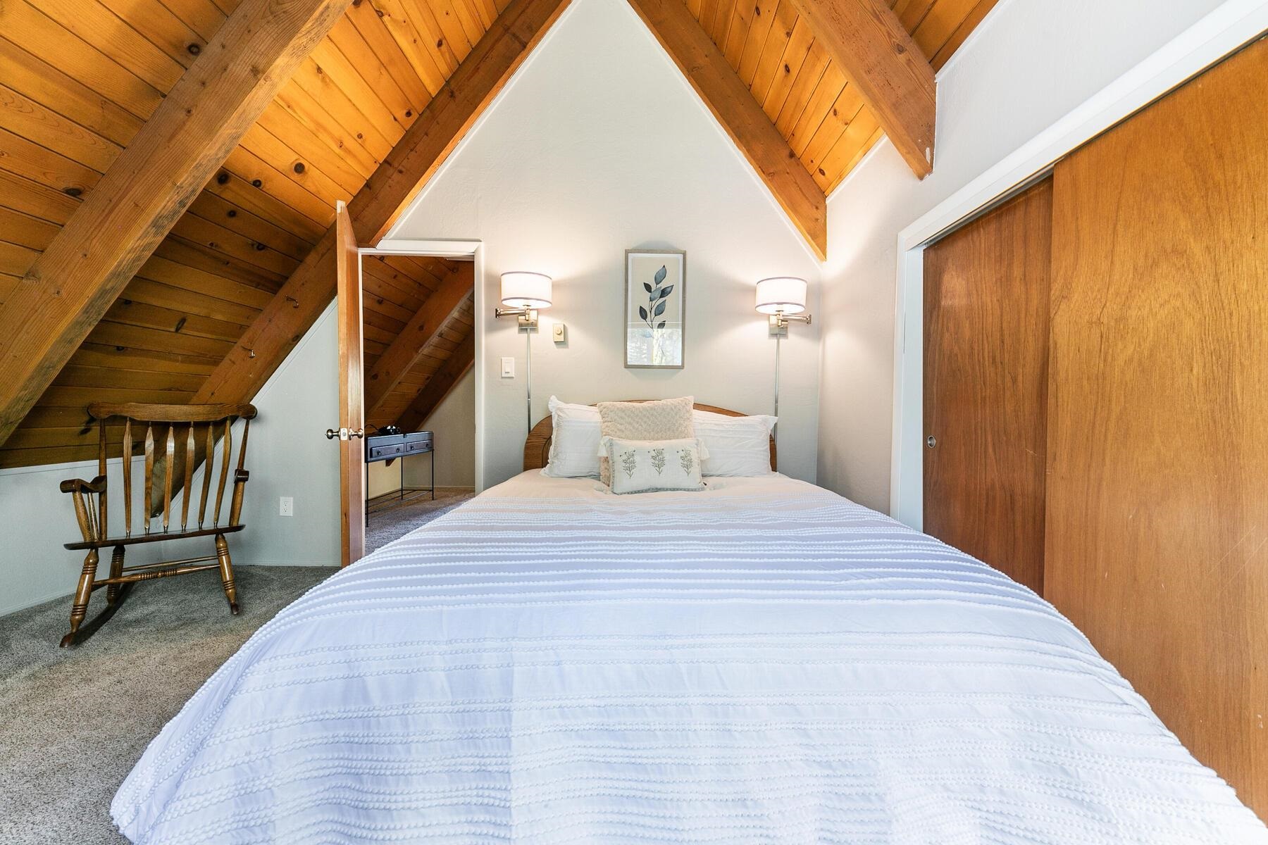 14395 South Shore Drive Truckee, CA 96161 - Photo 19 of 25 a bedroom with a bed and wooden floor