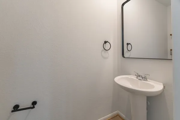 a swimming pool with wooden fence