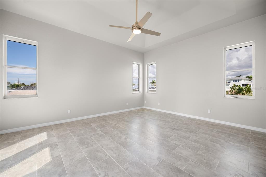 1950 Arkansas Avenue Englewood, FL 34224 - Photo 21 of 52 a view of an empty room with a window