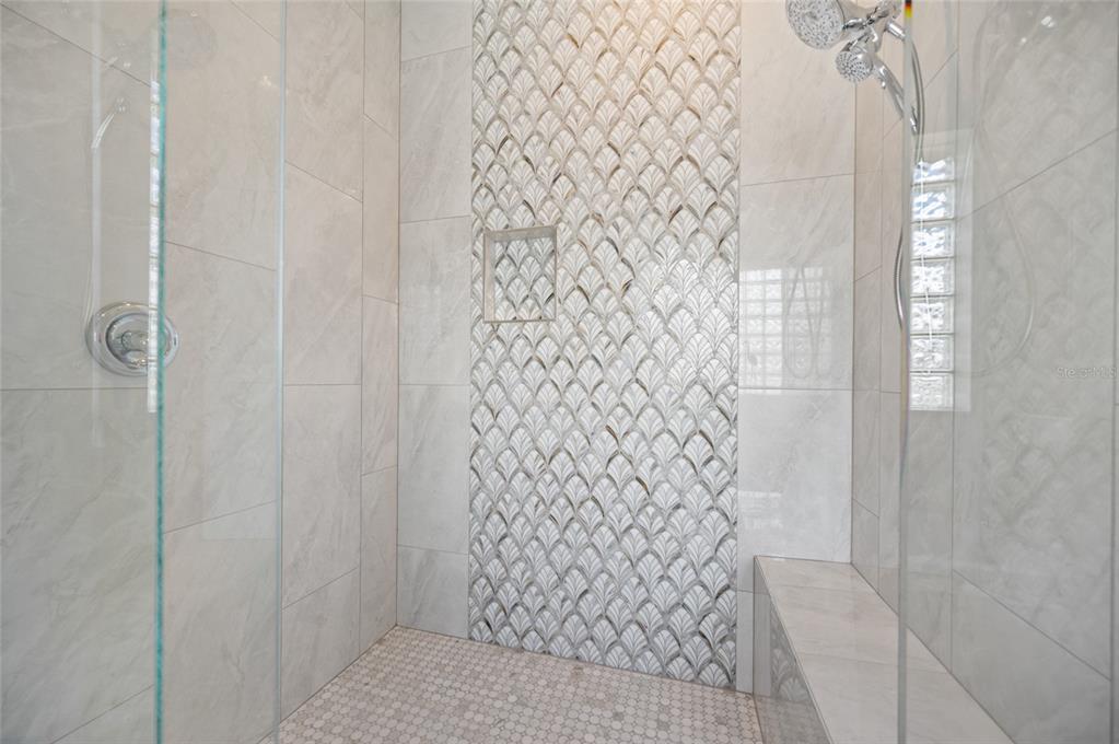 1950 Arkansas Avenue Englewood, FL 34224 - Photo 25 of 52 a bathroom with a shower curtain