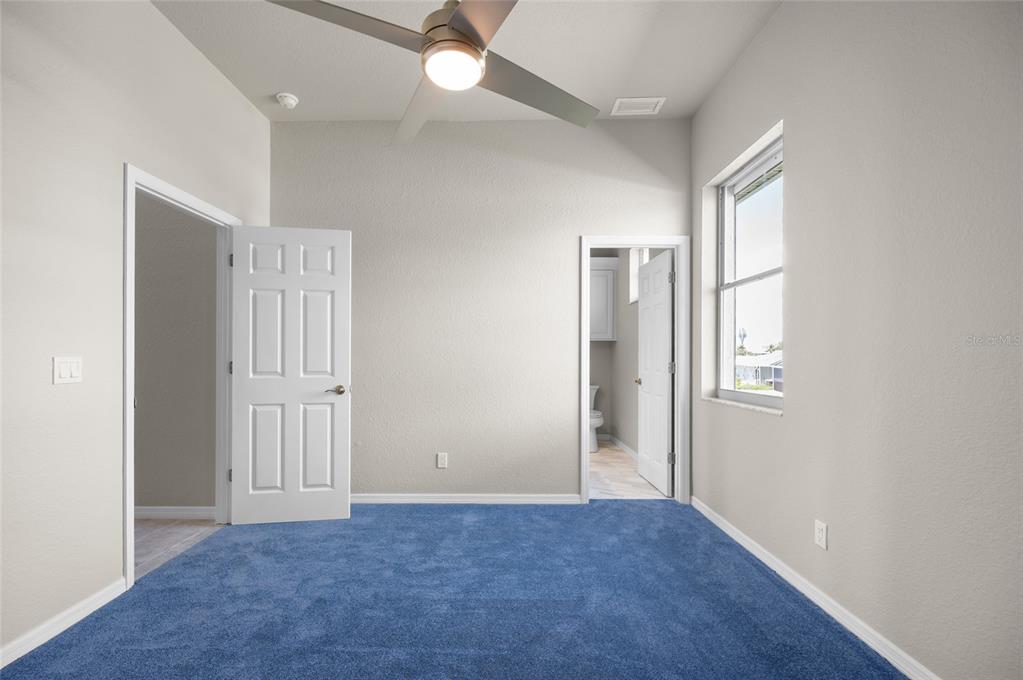1950 Arkansas Avenue Englewood, FL 34224 - Photo 28 of 52 an empty room with windows and closet