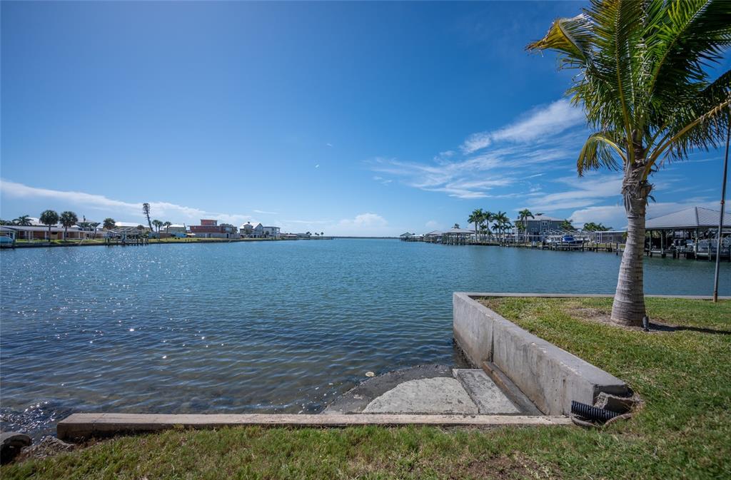 1950 Arkansas Avenue Englewood, FL 34224 - Photo 37 of 52 a view of a lake with houses in the back