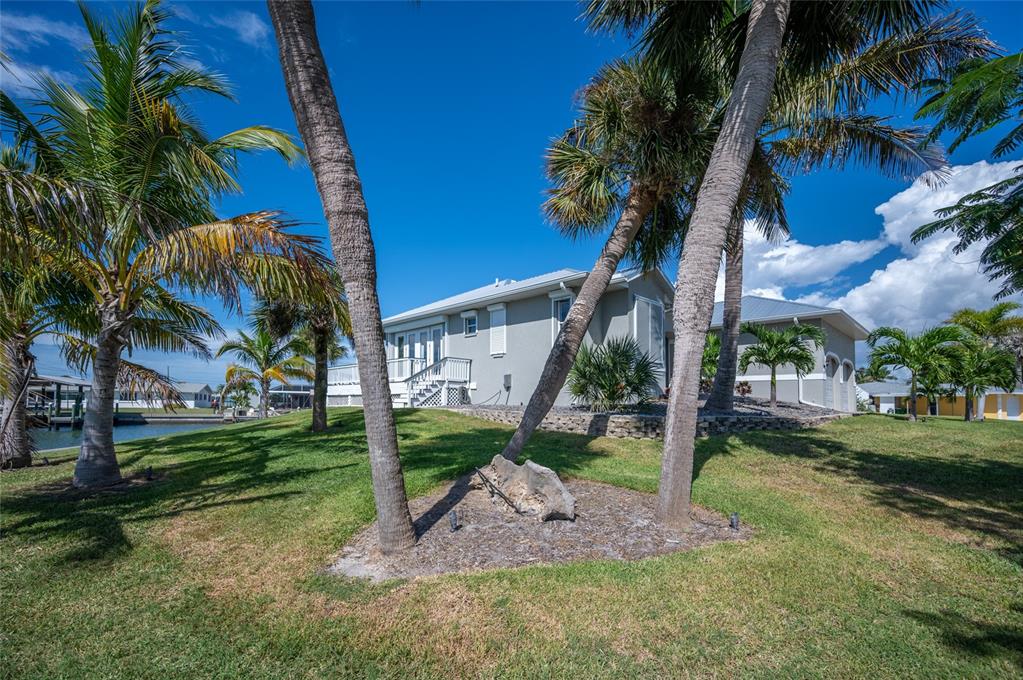 1950 Arkansas Avenue Englewood, FL 34224 - Photo 43 of 52 a view of a park with plants and palm trees