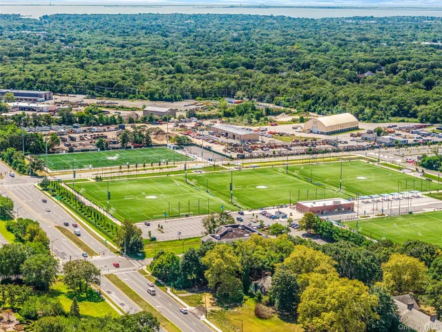 a aerial view of multiple houses with outdoor space