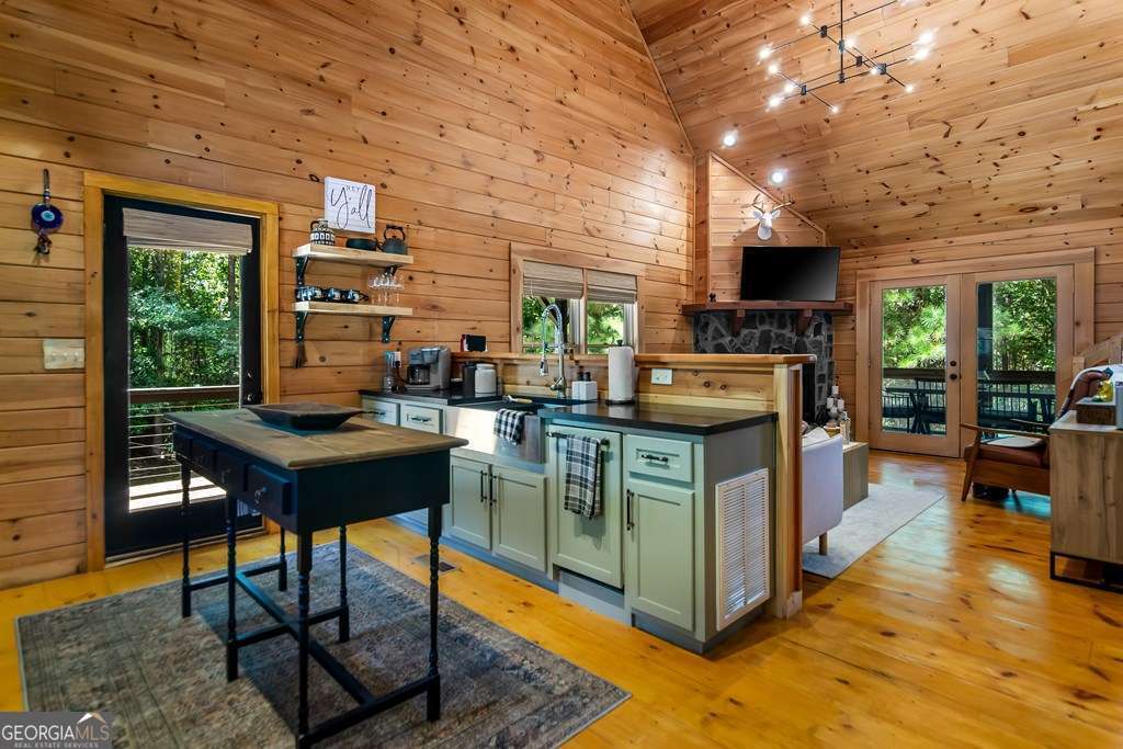 16 Toccoa Ridge Road, Unit 8 Mineral Bluff, GA 30559 - Photo 11 of 35 a kitchen with stainless steel appliances granite countertop a stove and a refrigerator