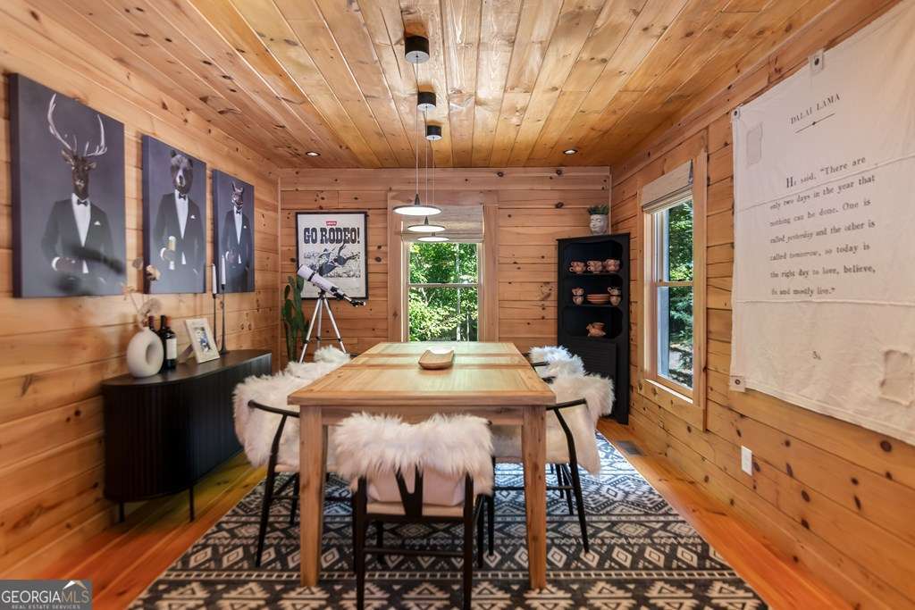 16 Toccoa Ridge Road, Unit 8 Mineral Bluff, GA 30559 - Photo 12 of 35 a view of a dining room with furniture window and wooden floor