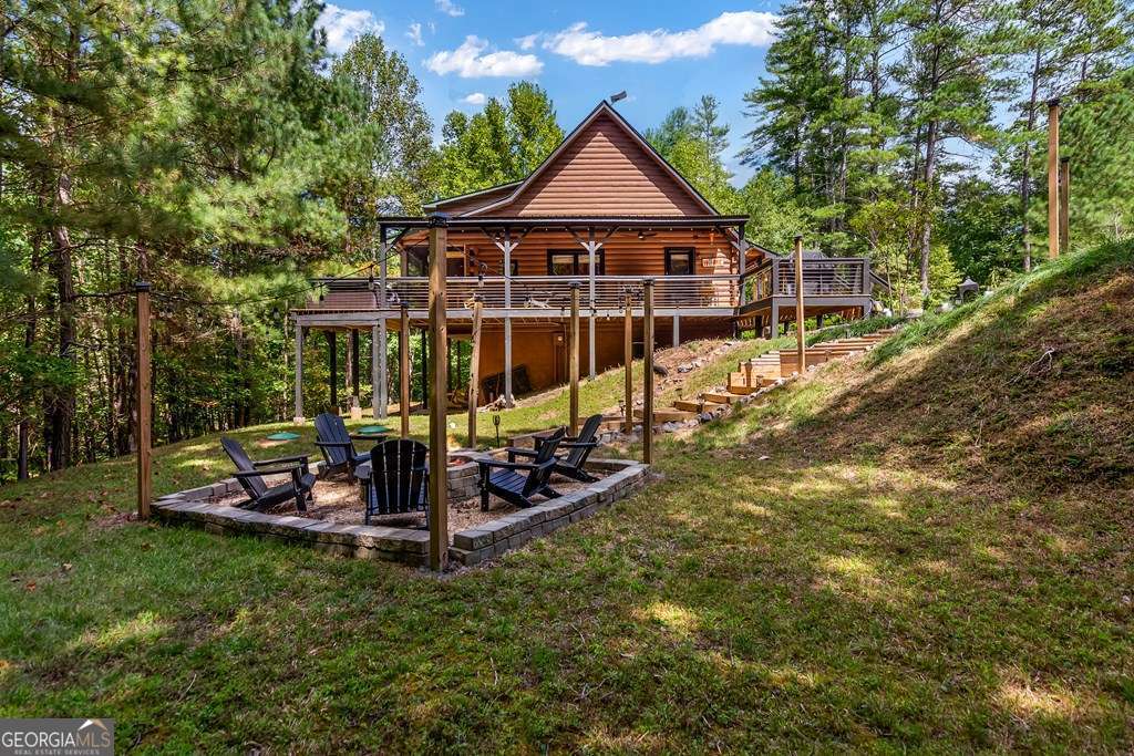 16 Toccoa Ridge Road, Unit 8 Mineral Bluff, GA 30559 - Photo 2 of 35 a view of a house with a yard patio and slide
