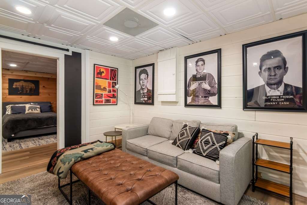 16 Toccoa Ridge Road, Unit 8 Mineral Bluff, GA 30559 - Photo 26 of 35 a living room with furniture and wooden floor