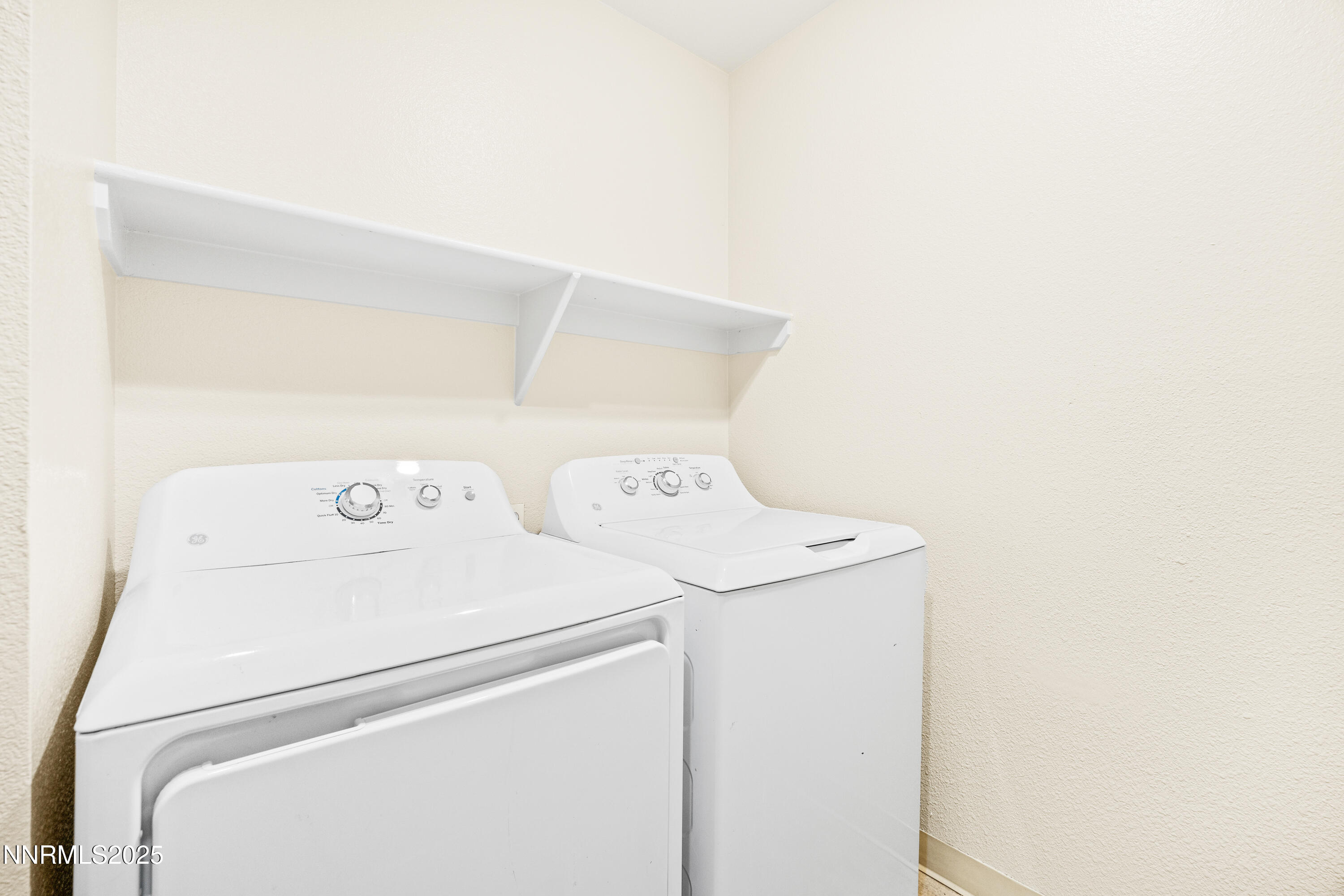 6850 Sharlands Avenue, Unit T1116 Reno, NV 89523 - Photo 11 of 26 a utility room with dryer and washer