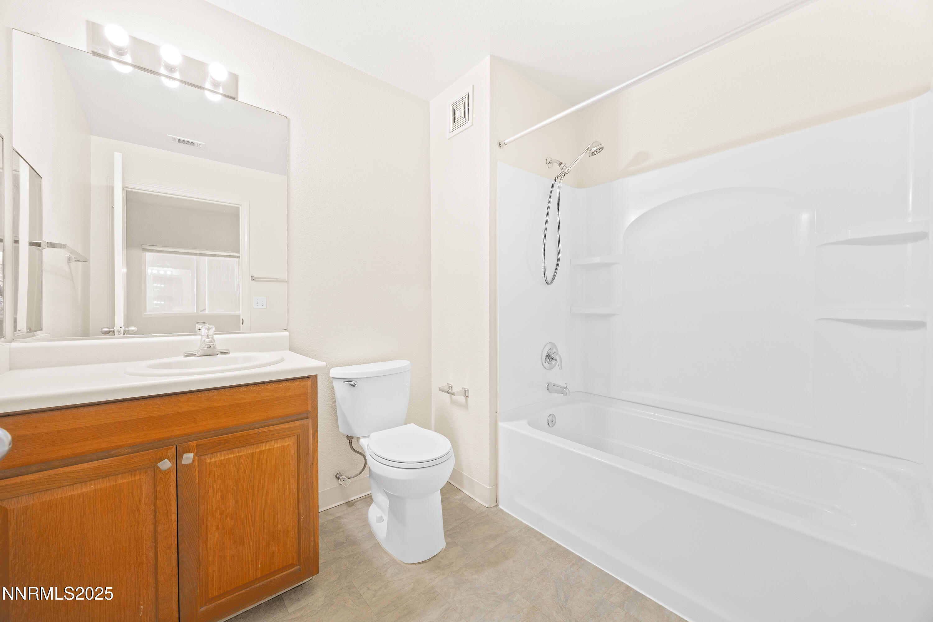 6850 Sharlands Avenue, Unit T1116 Reno, NV 89523 - Photo 14 of 26 a bathroom with a granite countertop sink a toilet and shower