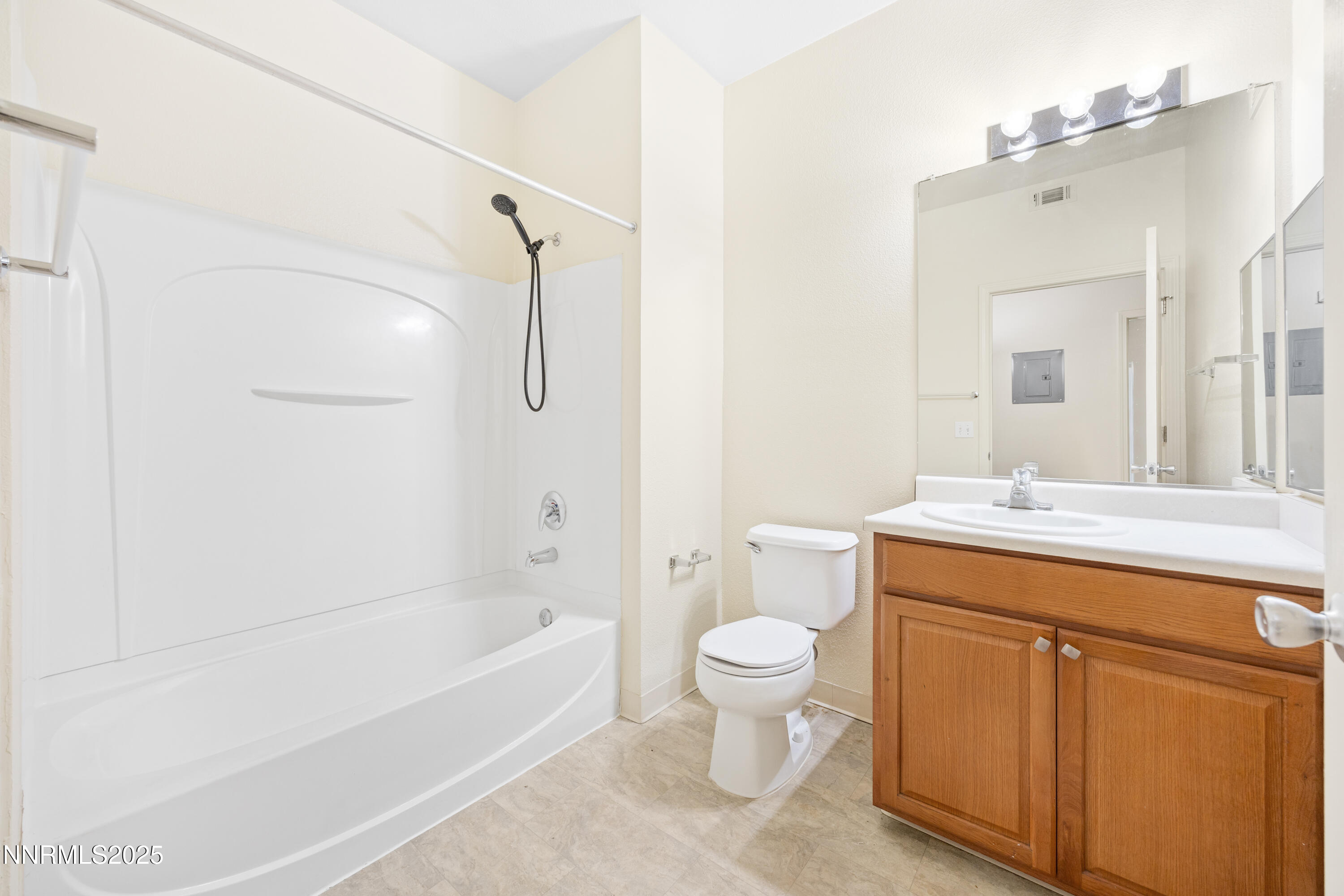 6850 Sharlands Avenue, Unit T1116 Reno, NV 89523 - Photo 18 of 26 a spacious bathroom with a granite countertop sink a toilet and shower