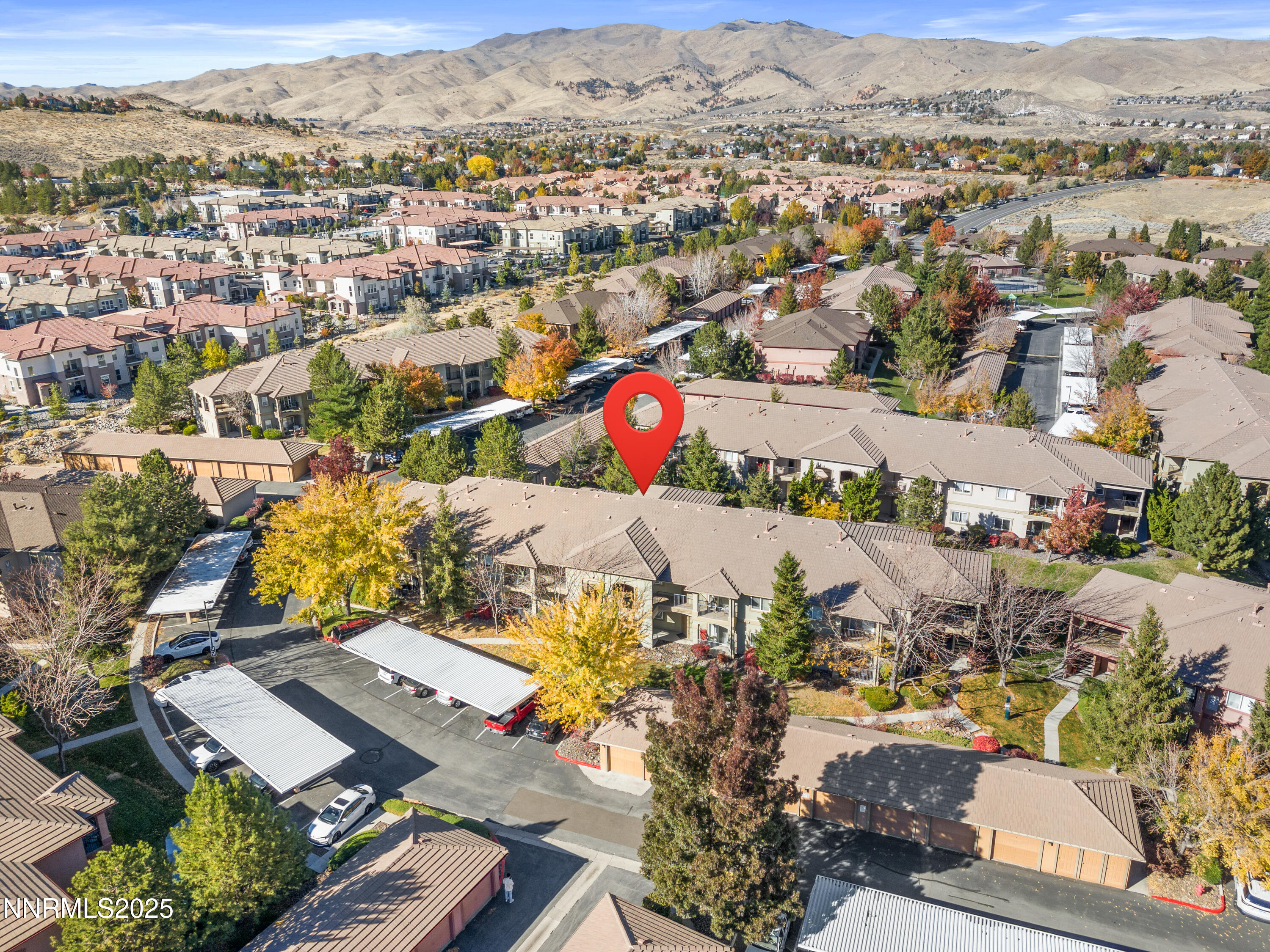 6850 Sharlands Avenue, Unit T1116 Reno, NV 89523 - Photo 2 of 26 an aerial view of a city with lots of residential buildings