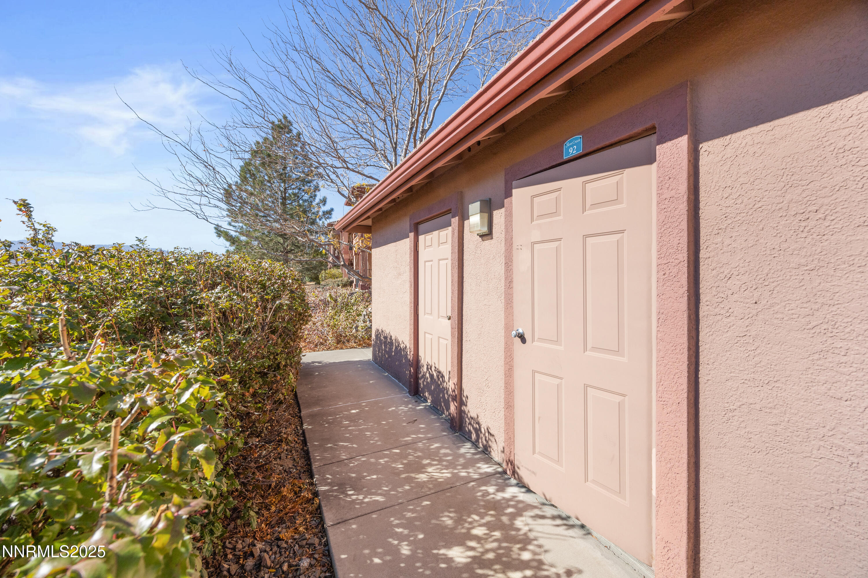 6850 Sharlands Avenue, Unit T1116 Reno, NV 89523 - Photo 24 of 26 a view of a pathway with a yard