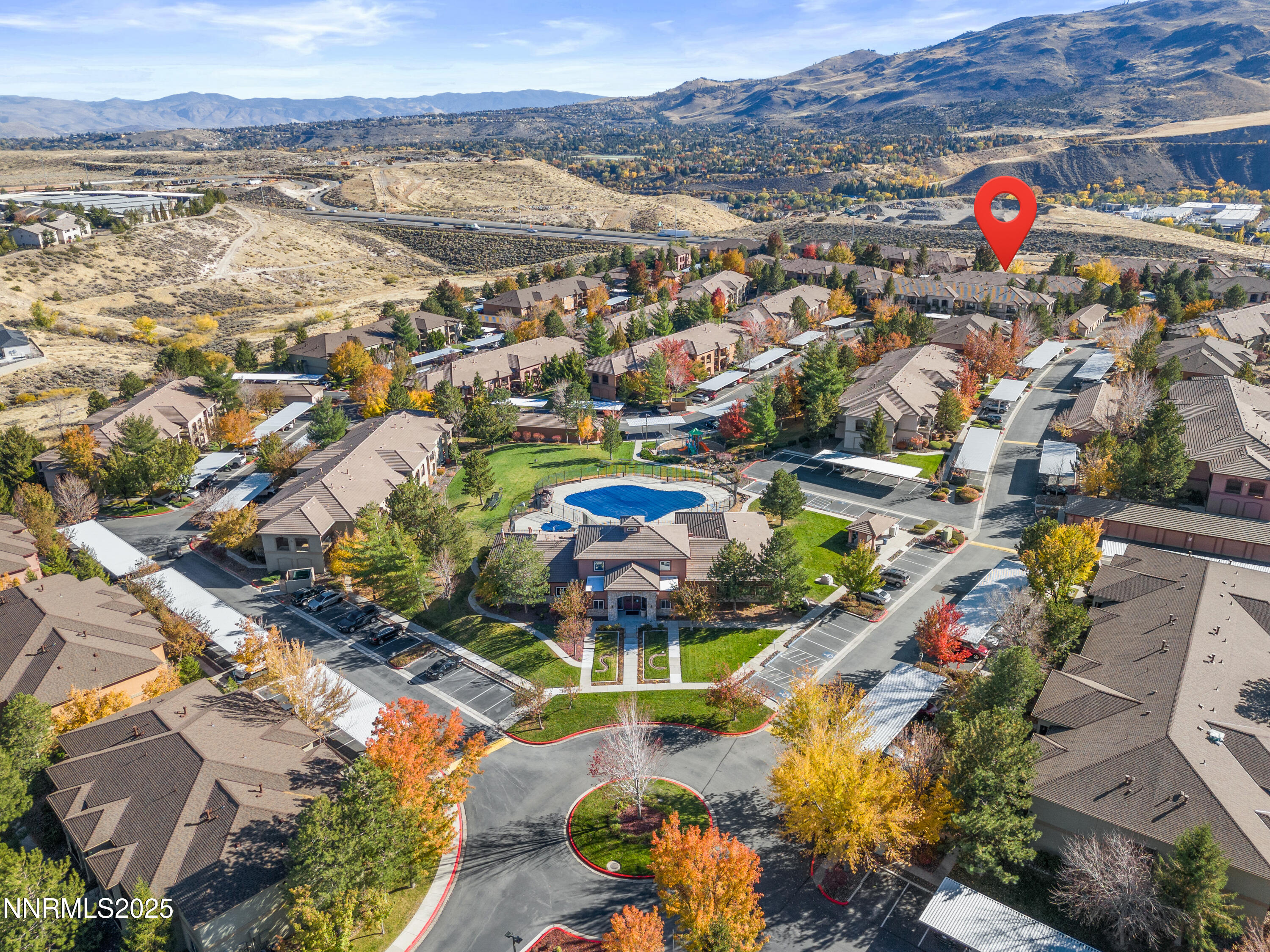 6850 Sharlands Avenue, Unit T1116 Reno, NV 89523 - Photo 3 of 26 an aerial view of residential houses with outdoor space