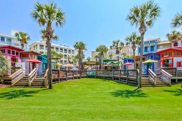 a front view of building and yard with swimming pool
