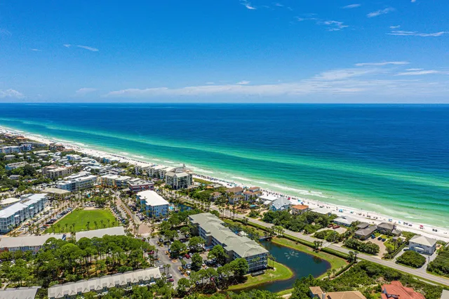an aerial view of residential house with outdoor space and swimming pool