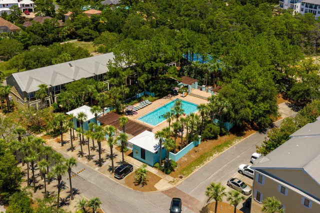 a view of street along with palm trees