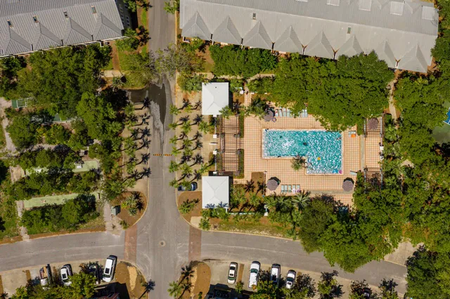 a view of a street with cars