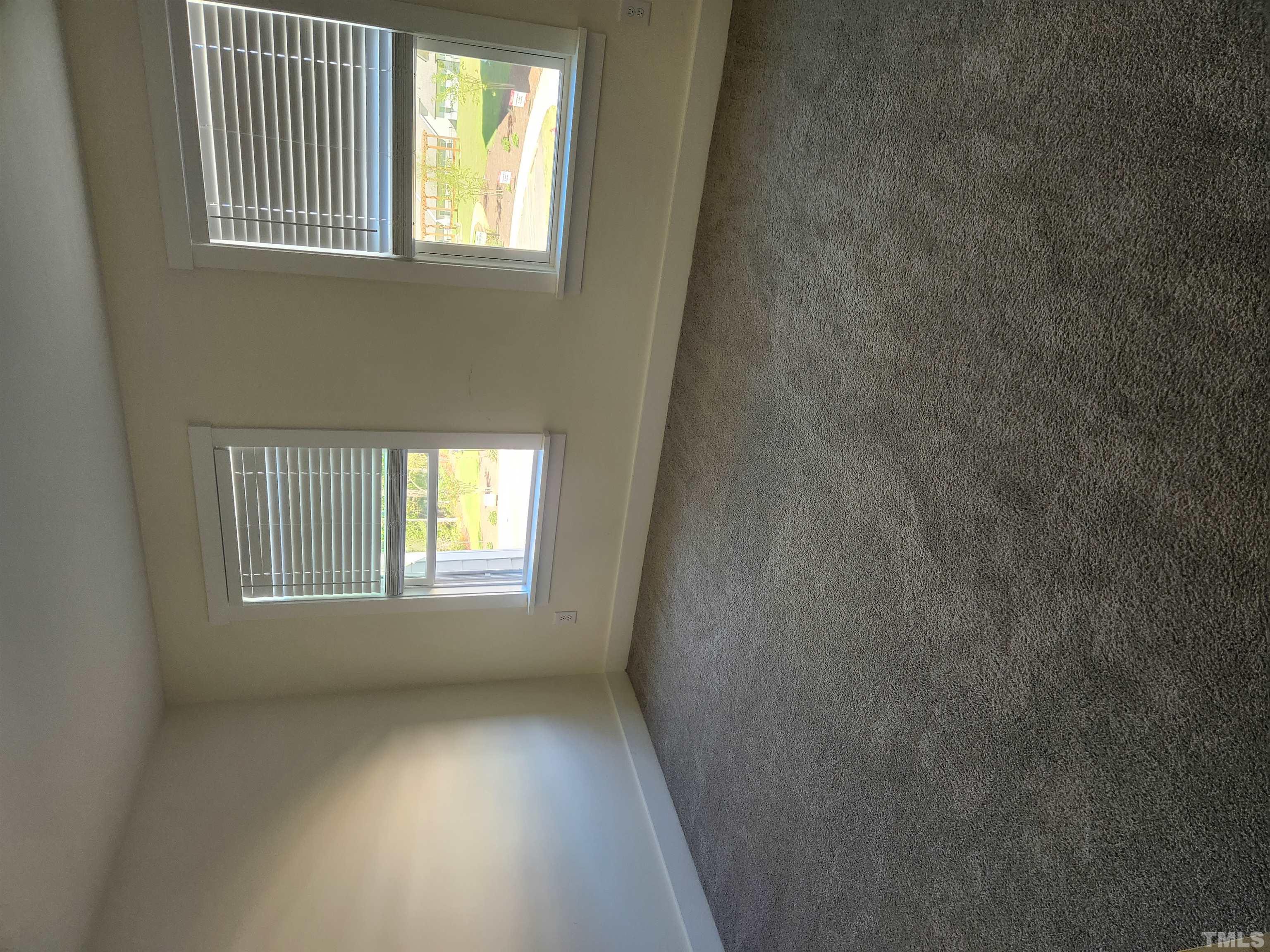 2093 Shaded Knoll Road Cary, NC 27519 - Photo 9 of 9 a view of an empty room with a window