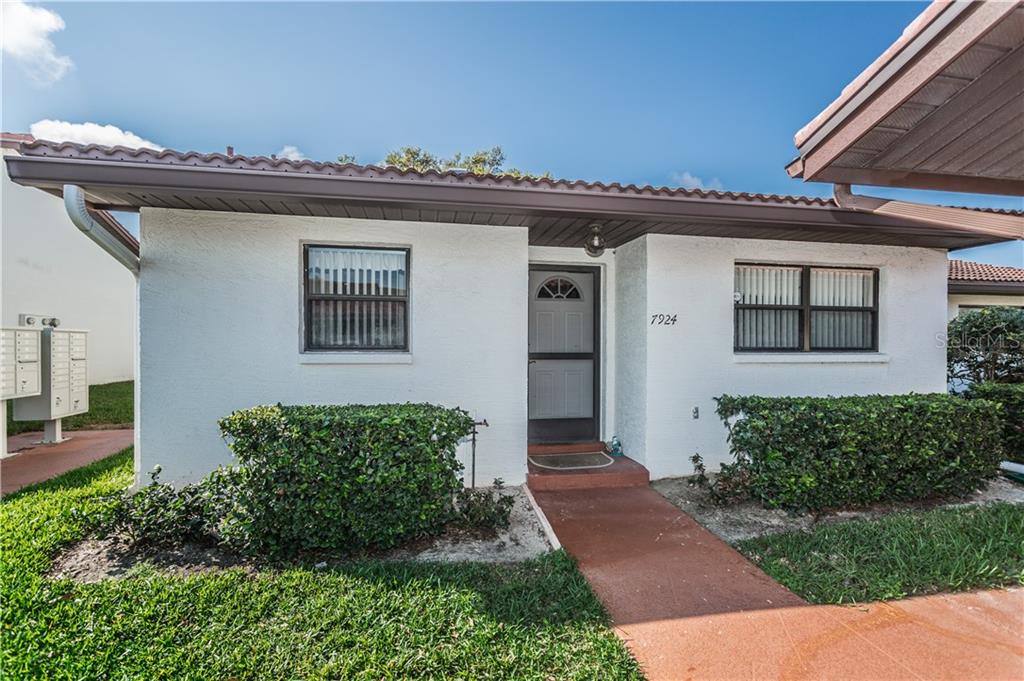 7924 Radcliffe Circle Port Richey, FL 34668 - Photo 1 of 1 Sought after end unit. Your mailbox is super close!