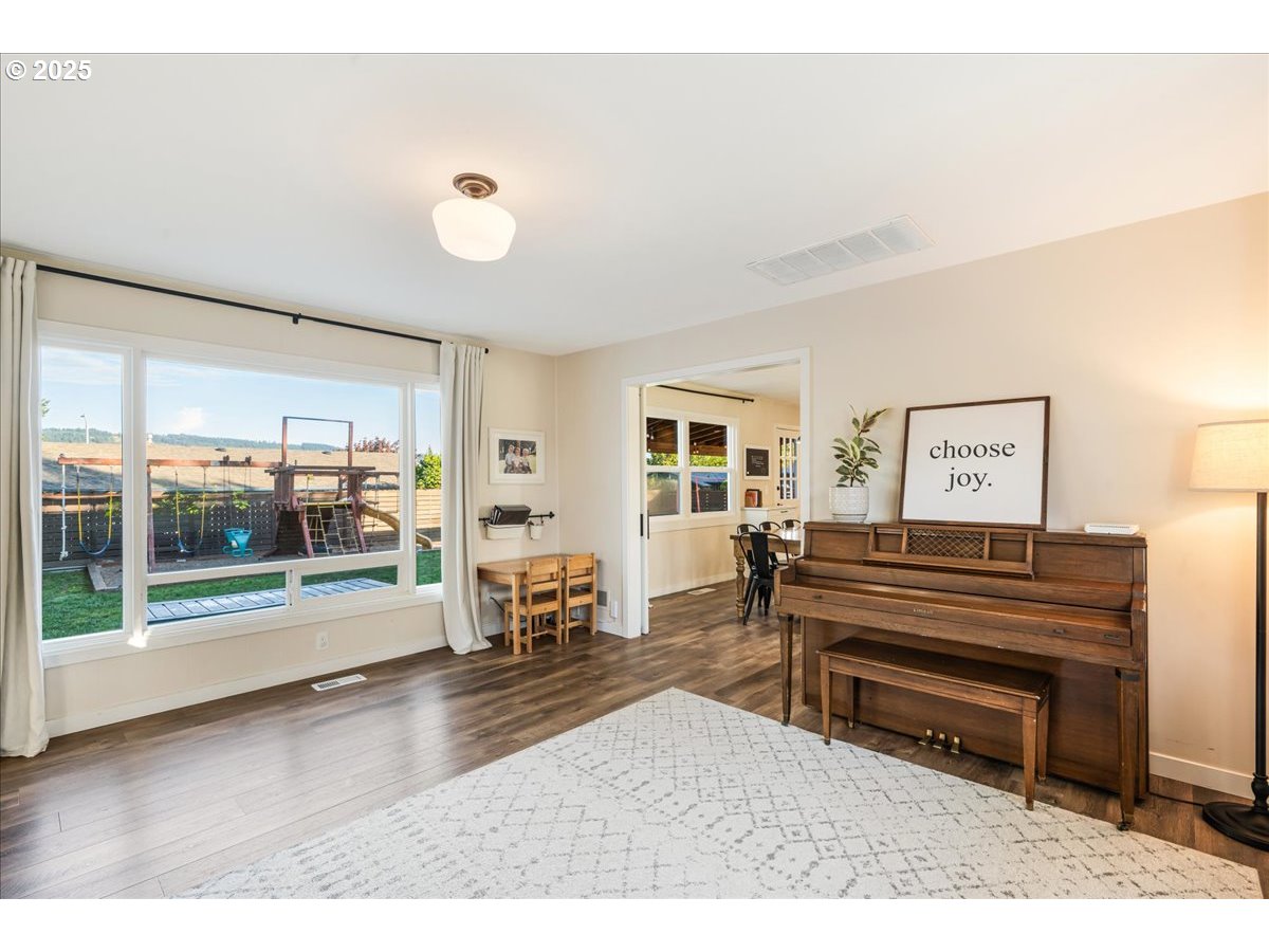 1200 Elm Lane Newberg, OR 97132 - Photo 16 of 32 a view of a livingroom with furniture and staircase