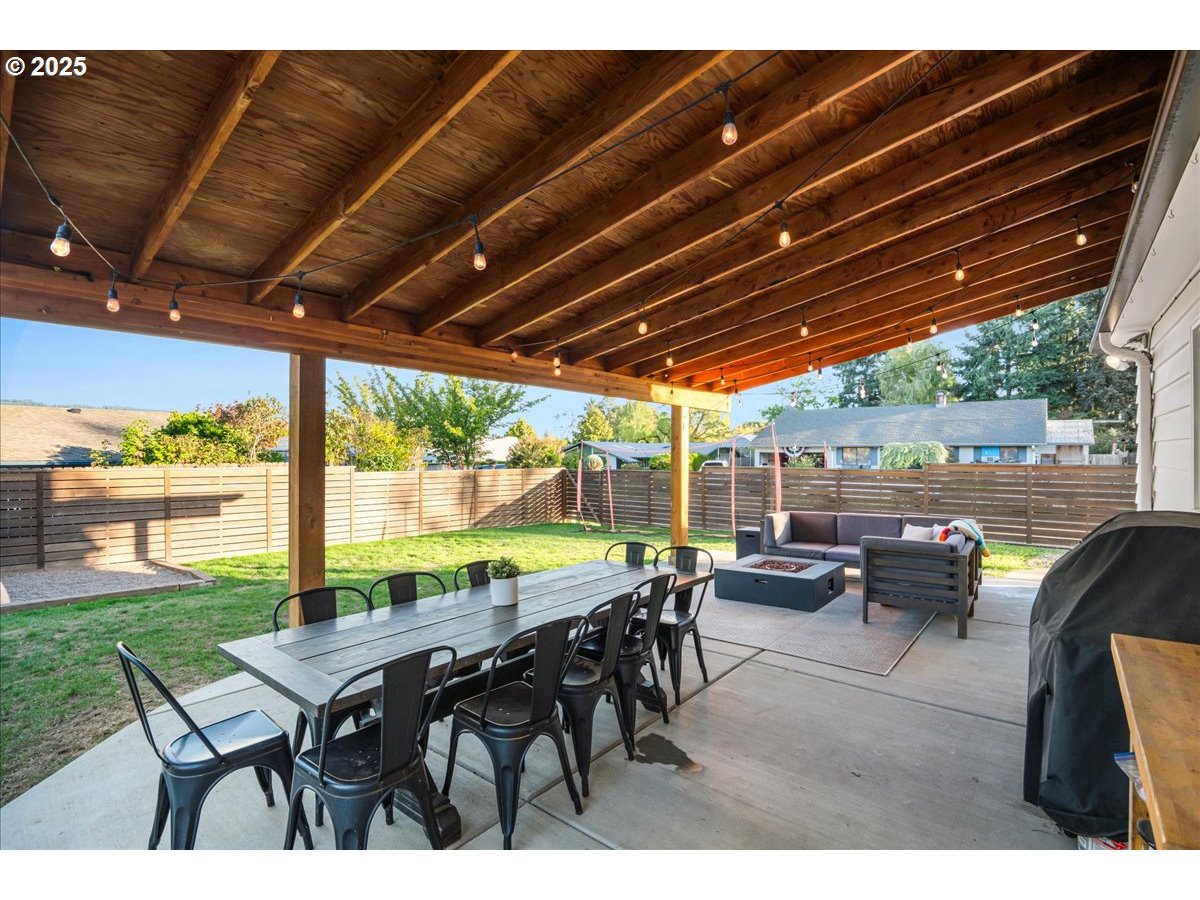 1200 Elm Lane Newberg, OR 97132 - Photo 27 of 32 a view of a patio with chairs and a patio