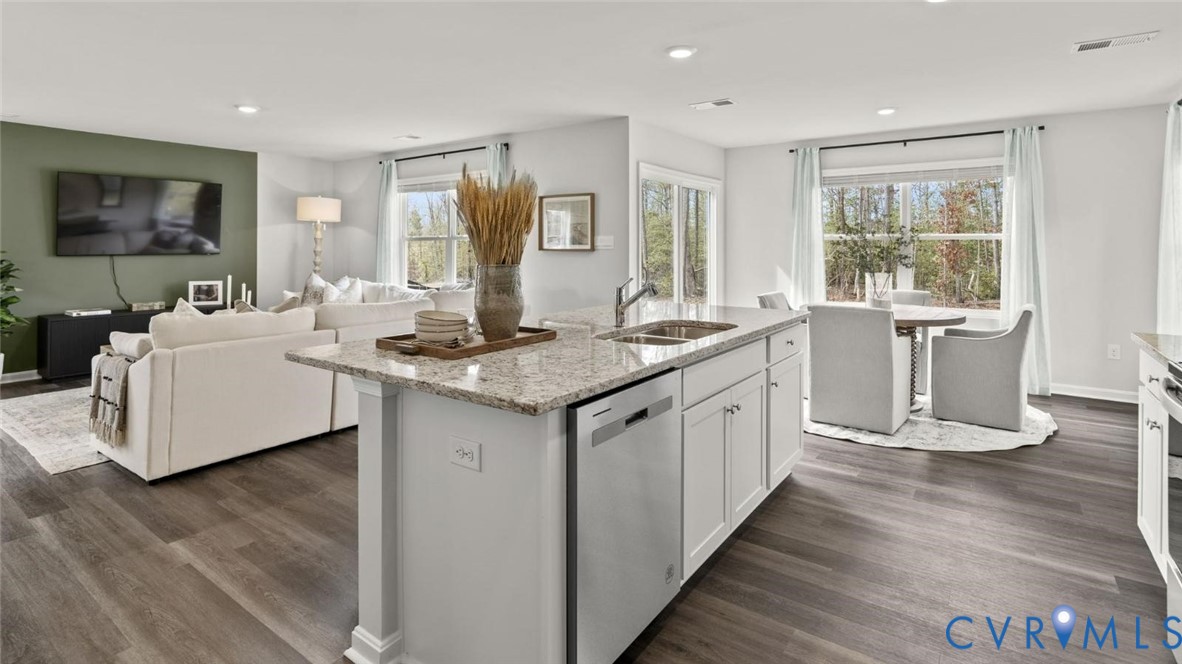 1760 River Vista Road Hopewell, VA 23860 - Photo 4 of 21 a kitchen with granite countertop a sink stove and cabinets