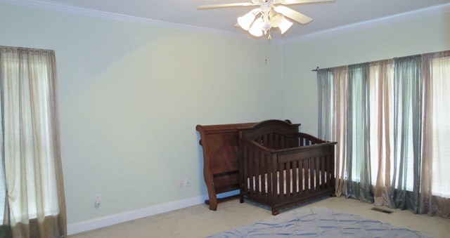 321 Eagle Ridge Road Macon, GA 31216 - Photo 11 of 23 an empty room with a window and a chandelier
