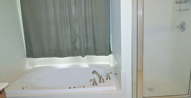 321 Eagle Ridge Road Macon, GA 31216 - Photo 13 of 23 a bathroom with a bathtub