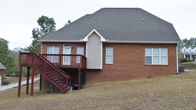 321 Eagle Ridge Road Macon, GA 31216 - Photo 20 of 23 a front view of a house with wooden stairs