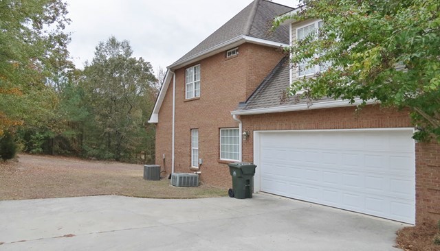 321 Eagle Ridge Road Macon, GA 31216 - Photo 23 of 23 a view of a house with a garage
