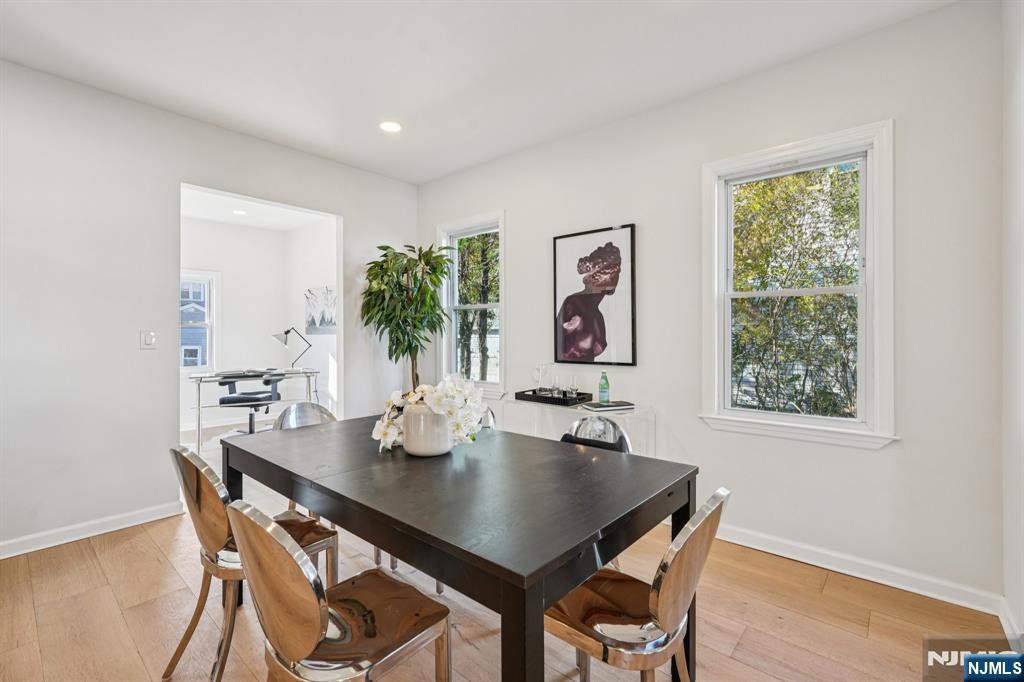51 Highland Place Ridgefield Park, NJ 07660 - Photo 11 of 35 a view of a dining room with furniture and window